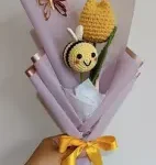 Flor girasol tonos pastel y lazo de yute